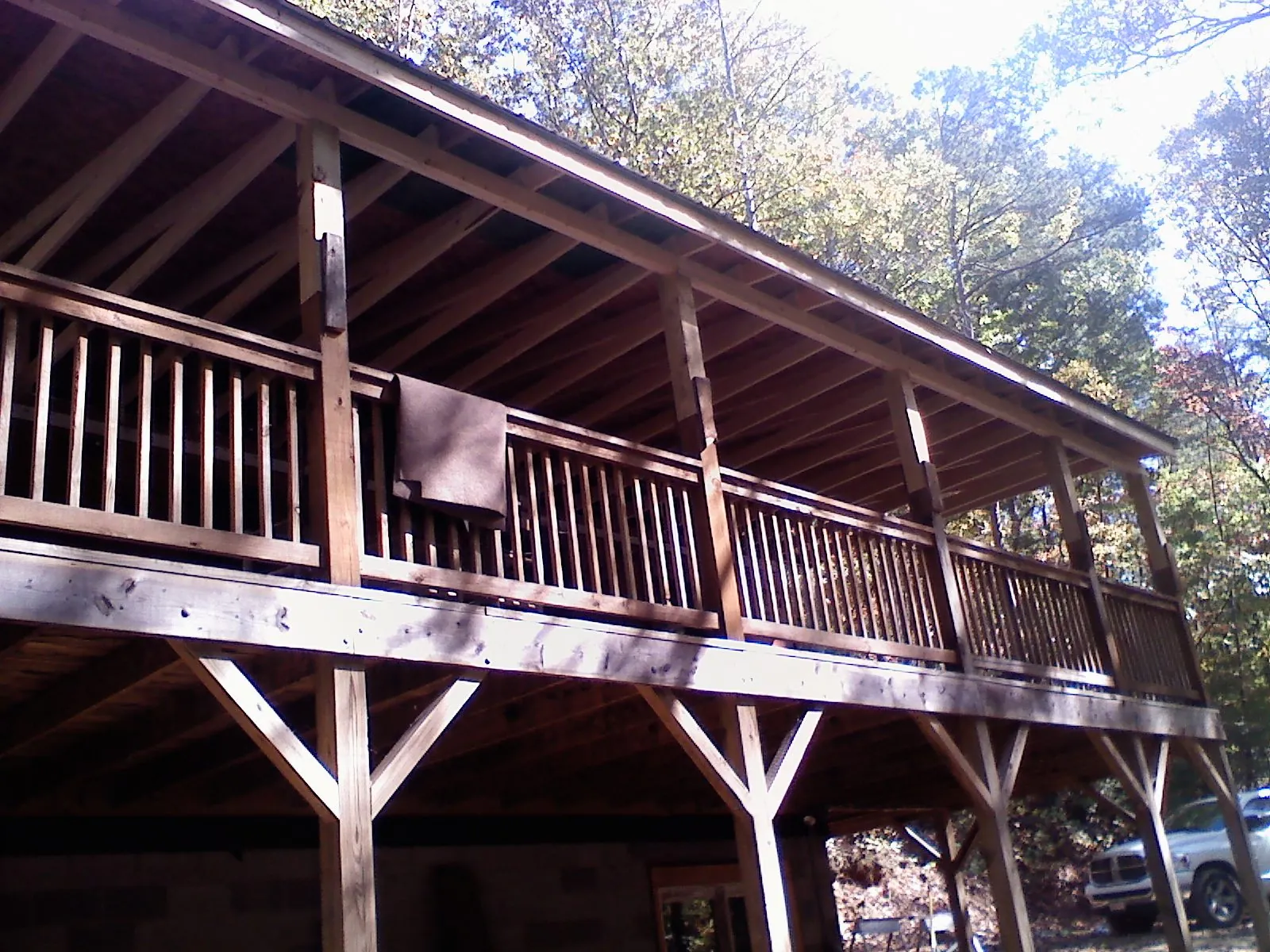 Timber framing under a new elevated porch and deck — Roof Leak Repair in Eagle Mountain by Roofing Brothers